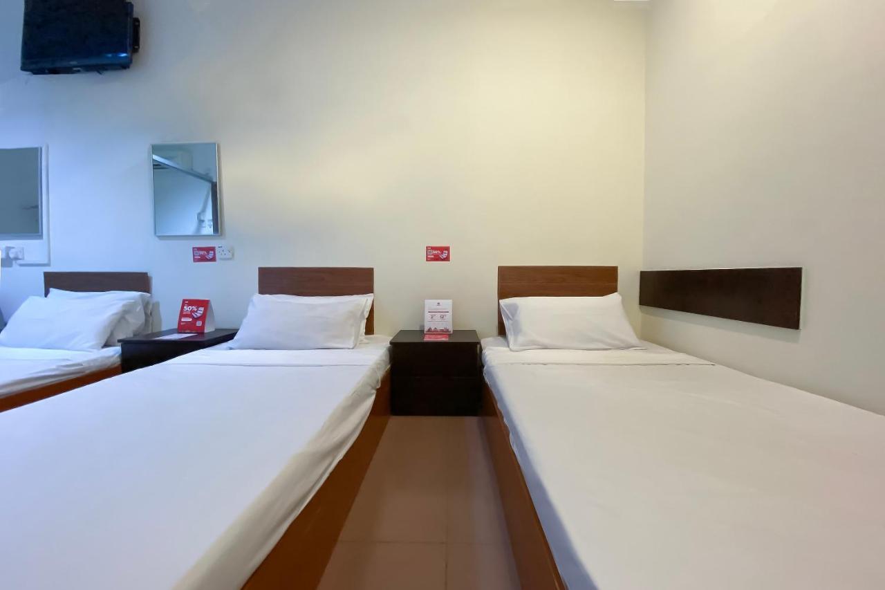 Spot On 89907 Motel Impian Сері-Манджунґ Екстер'єр фото